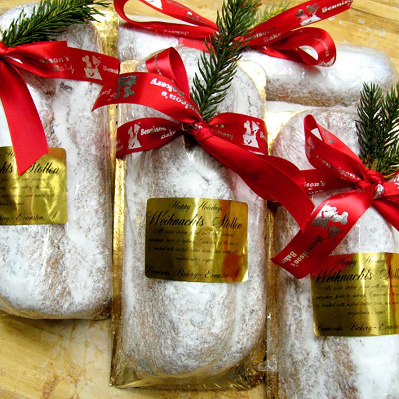 Picture of christmas stollen inside a bag with a red bow